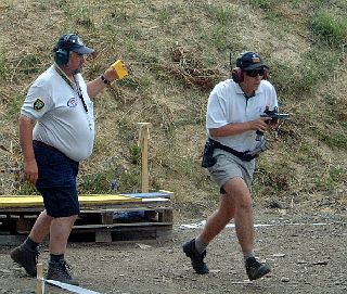 Remy is correcting the gun after he grabbed it 